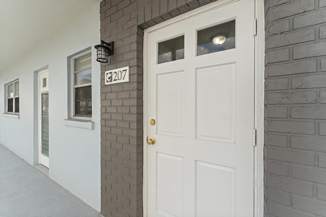 entrance to property with a porch