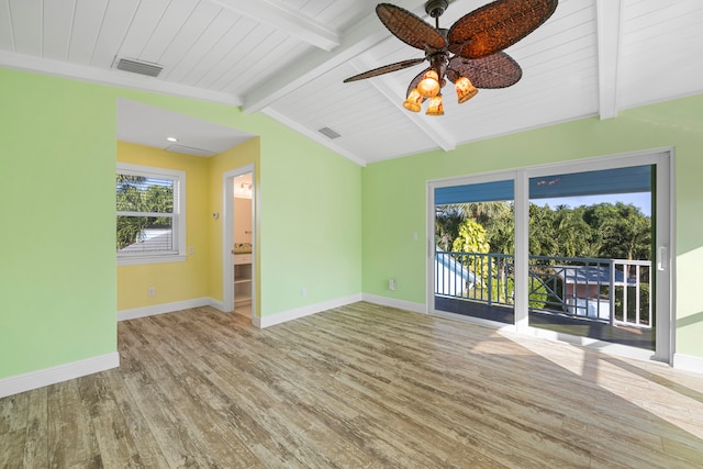 empty room featuring light hardwood / wood-style floors, vaulted ceiling with beams, and ceiling fan