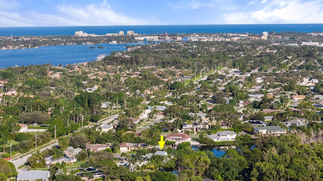 birds eye view of property featuring a water view