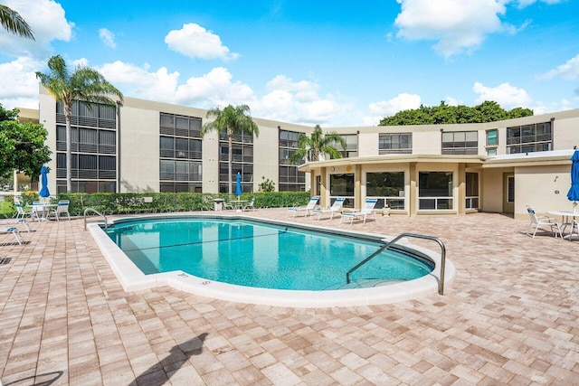 view of pool featuring a patio area