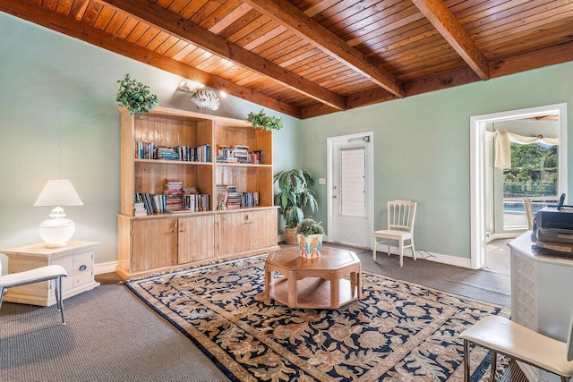 carpeted living room with beamed ceiling and wooden ceiling