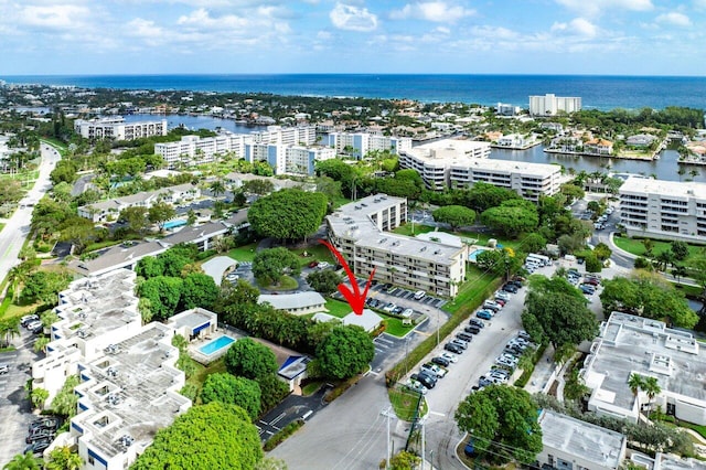 birds eye view of property featuring a water view