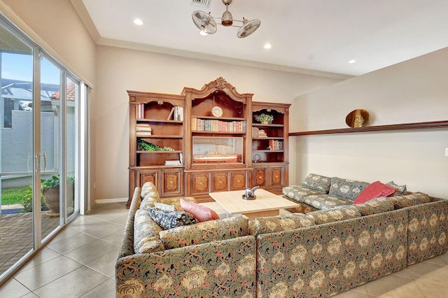 living room featuring crown molding and light tile patterned flooring