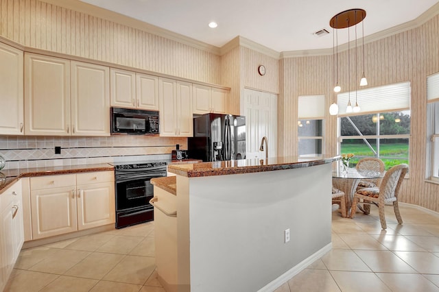 kitchen featuring pendant lighting, a center island, backsplash, black appliances, and light tile patterned floors