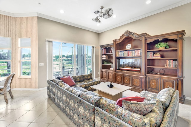 living room featuring ornamental molding and light tile patterned floors