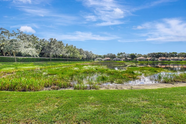 view of yard with a water view