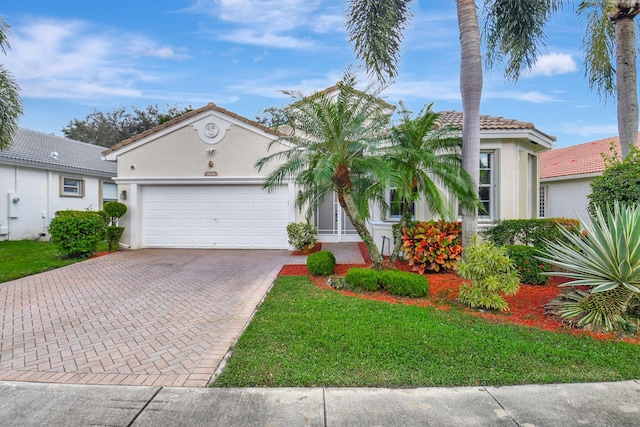 view of front of property featuring a garage