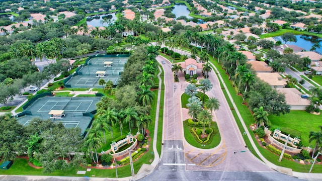 drone / aerial view with a water view