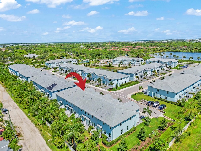 392 SE Sea Hunt Way, Stuart, FL 34994 - bird's eye view of a large body of water and a tree filled landscape