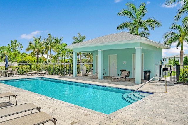 392 SE Sea Hunt Way, Stuart, FL 34994 - community pool featuring a patio