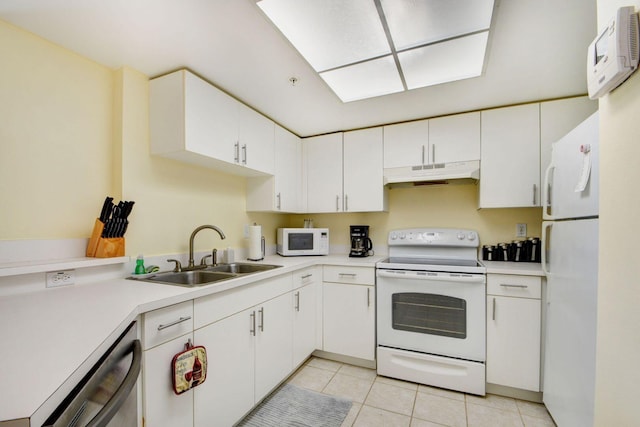 kitchen featuring white cabinetry, white appliances, and sink