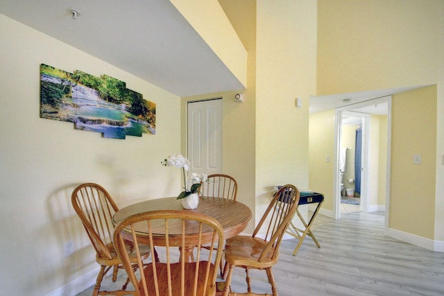 dining area with light wood-type flooring