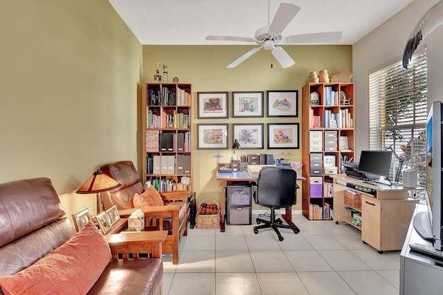 tiled home office with a textured ceiling and ceiling fan