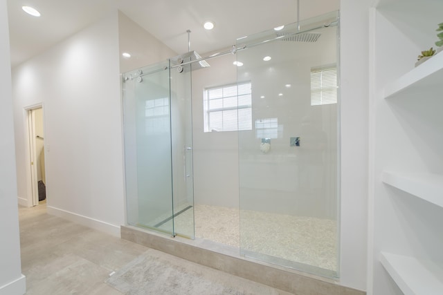 bathroom with tiled shower