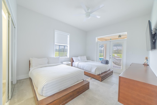 bedroom featuring access to outside, ceiling fan, and french doors