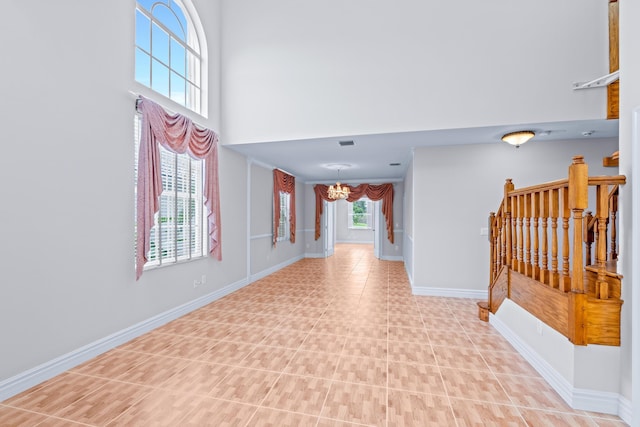 foyer featuring a high ceiling