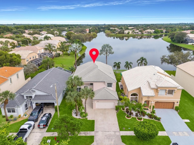 aerial view featuring a water view