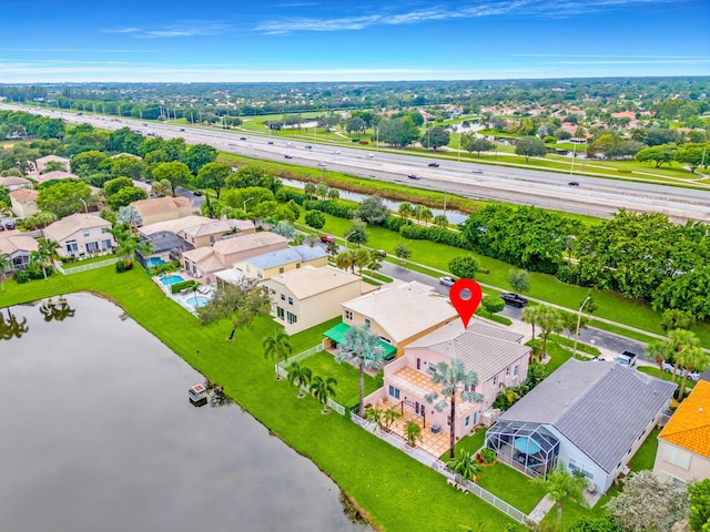 drone / aerial view featuring a water view