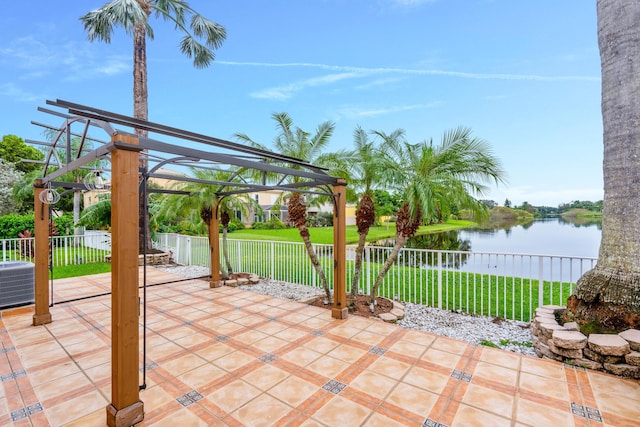 view of patio / terrace featuring a pergola, a water view, and central air condition unit