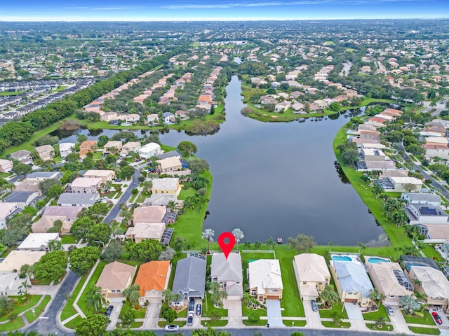 drone / aerial view featuring a water view