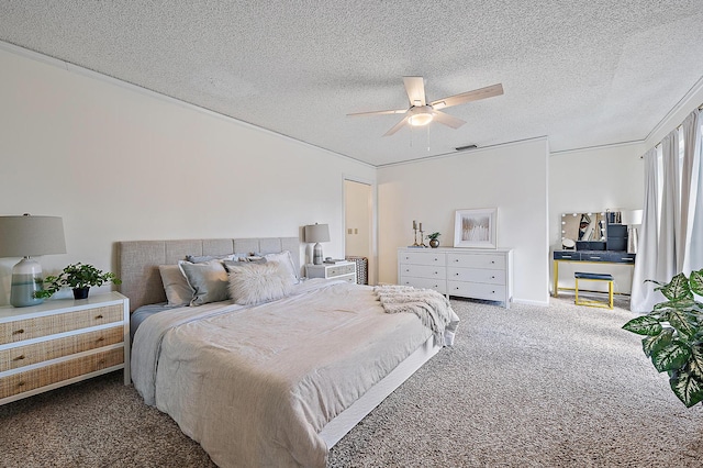 bedroom with carpet floors, a textured ceiling, and a ceiling fan