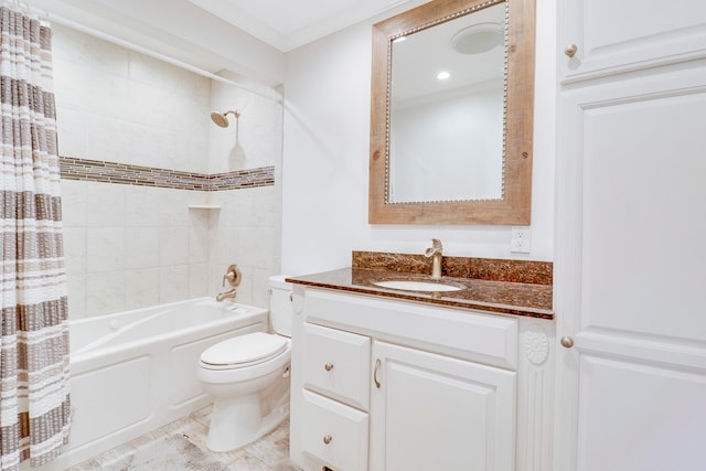 full bathroom featuring vanity, toilet, tiled shower / bath, and ornamental molding