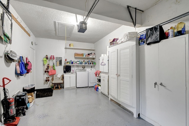 garage with a garage door opener, electric panel, and washing machine and clothes dryer