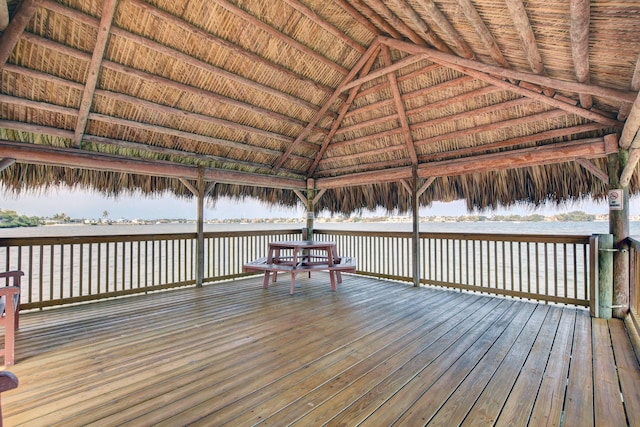 deck with a water view and a gazebo