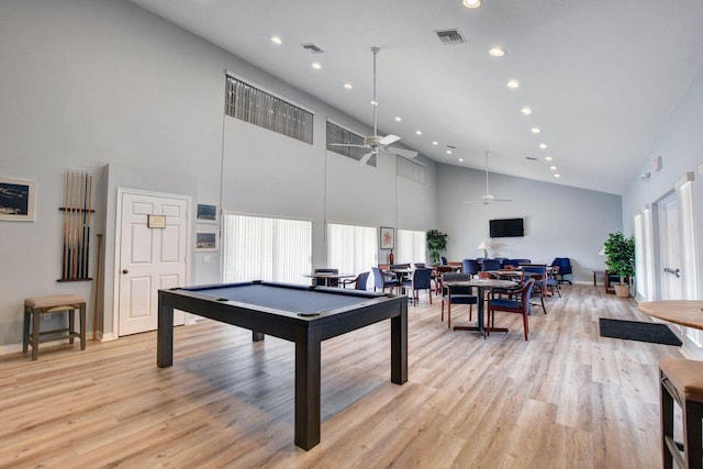 recreation room with high vaulted ceiling, ceiling fan, light hardwood / wood-style floors, and pool table