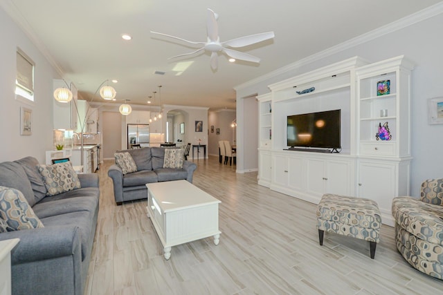 living room with ceiling fan, light hardwood / wood-style flooring, sink, and ornamental molding