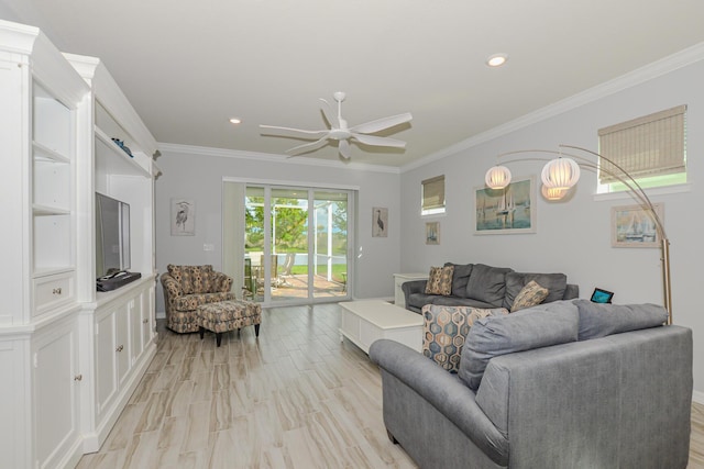 living room featuring ceiling fan and ornamental molding