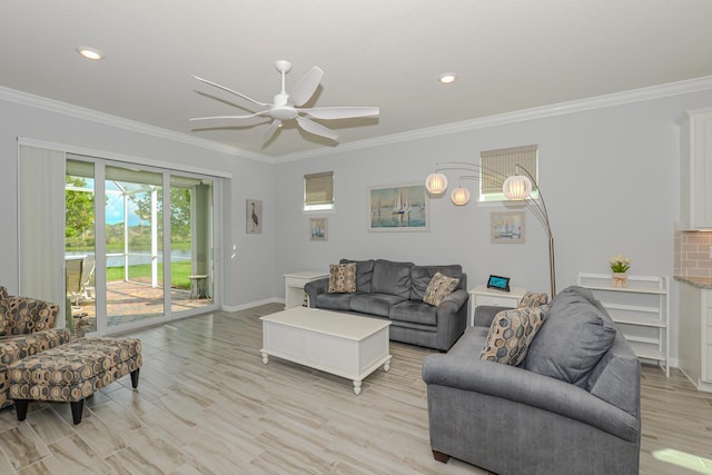 living room with ceiling fan, light hardwood / wood-style floors, and ornamental molding