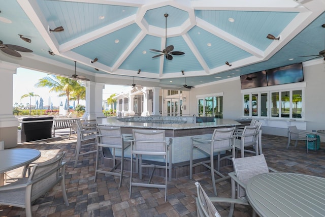 view of patio / terrace featuring a gazebo and a bar