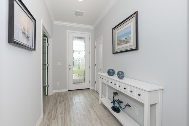 interior space with plenty of natural light and ornamental molding