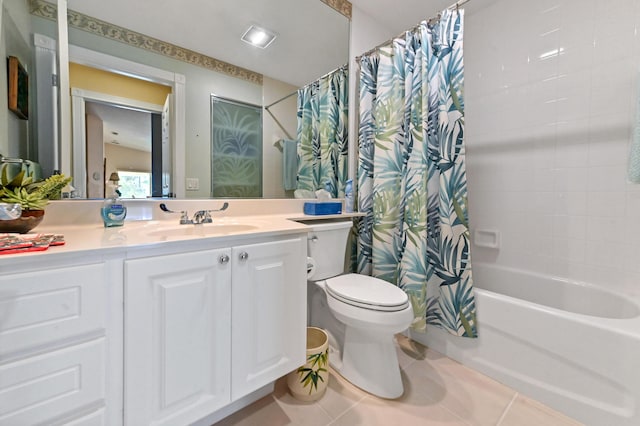 full bathroom with toilet, vanity, shower / bath combo, and tile patterned flooring