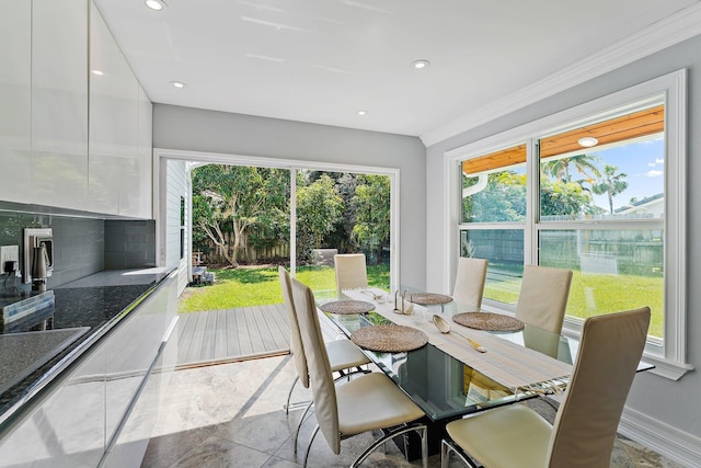 dining room featuring ornamental molding