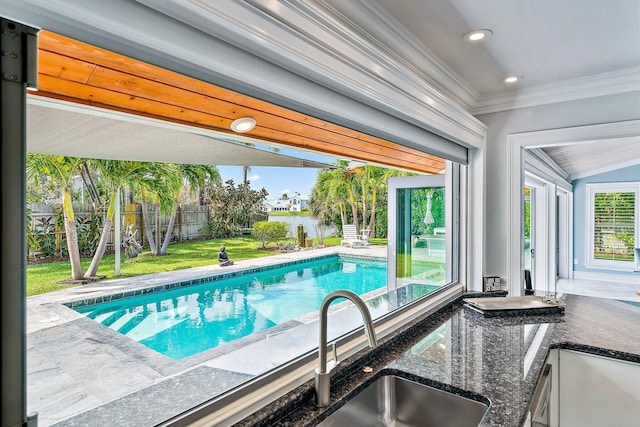 view of pool featuring sink