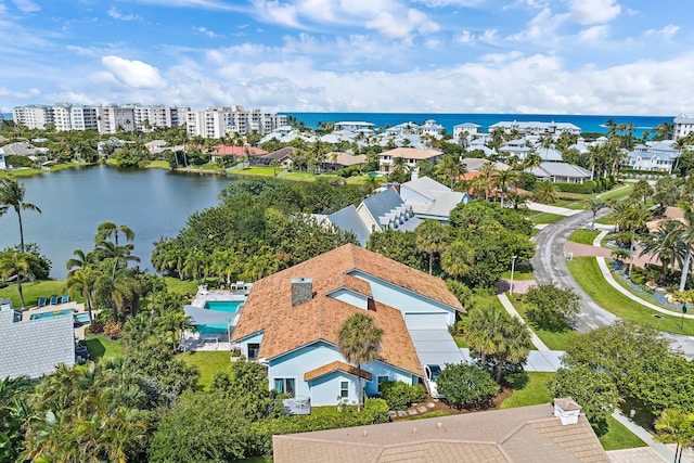 bird's eye view with a water view