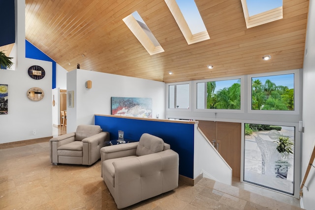 living room featuring high vaulted ceiling and wood ceiling