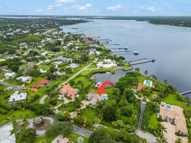 birds eye view of property featuring a water view