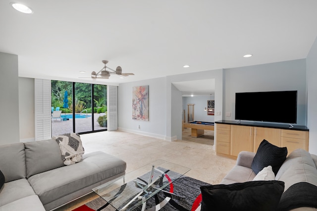 living room featuring ceiling fan