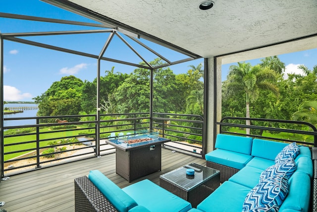 unfurnished sunroom with a water view and vaulted ceiling