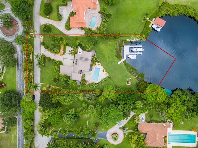 birds eye view of property featuring a water view