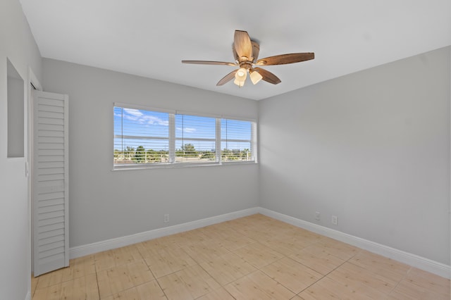 empty room featuring ceiling fan