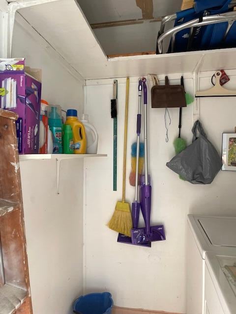 laundry room with separate washer and dryer