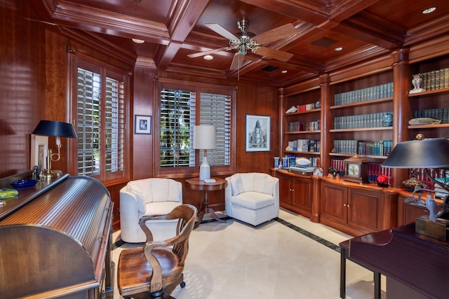 tiled office space with ceiling fan, coffered ceiling, built in features, beamed ceiling, and wood walls