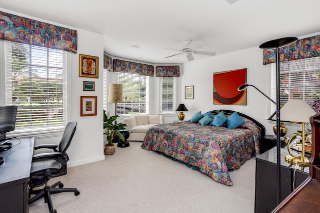 bedroom with ceiling fan and carpet