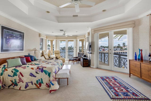 bedroom featuring french doors, access to outside, a raised ceiling, ceiling fan, and crown molding