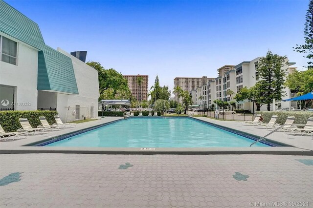 view of swimming pool featuring a patio