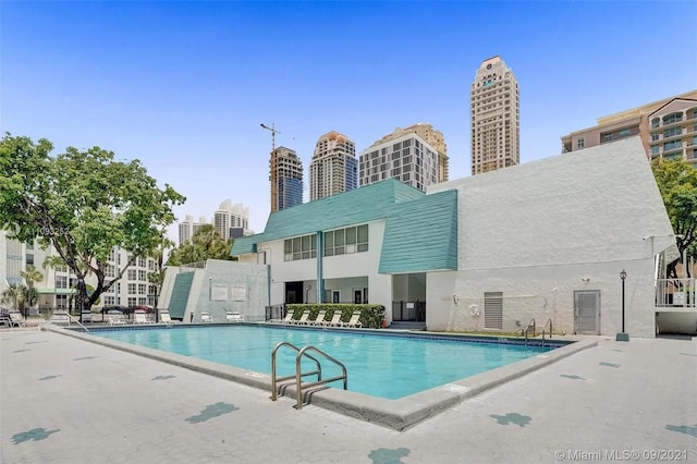 view of pool with a patio area